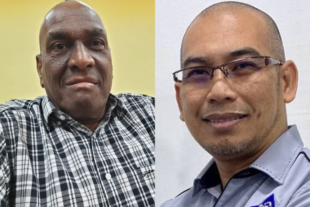 A delegate and council member A.Sivananthan (Right) and MTUC deputy president Mohd Affendy Abdul Ghani (left).