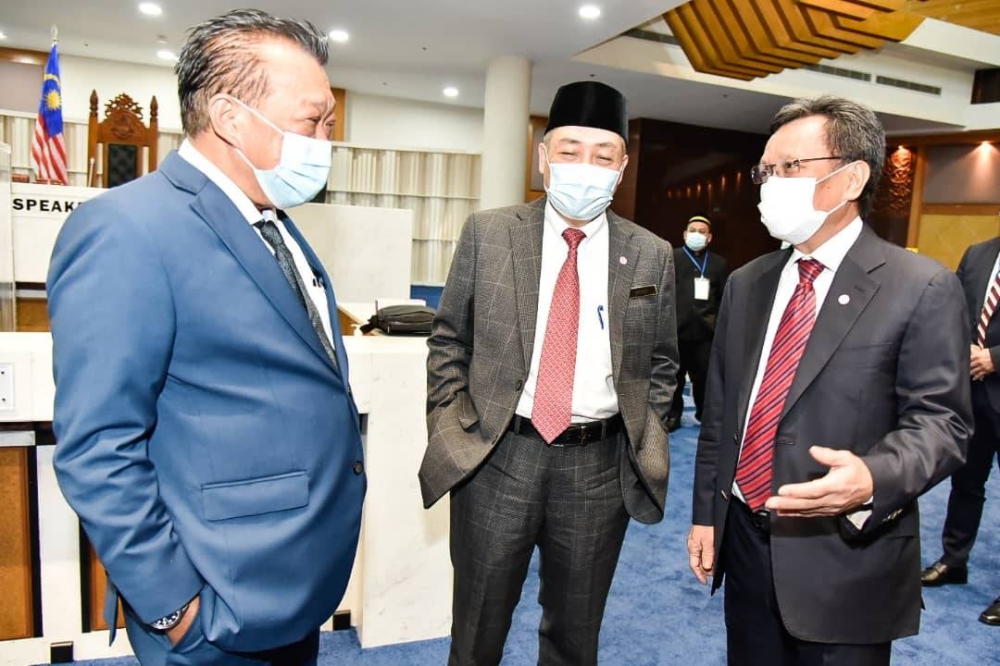 Datuk Seri Mohd Shafie Apdal with Sabah Chief Minister Datuk Seri Hajiji Noor and Deputy Chief Minister Datuk Seri Bung Moktar Radin at the state legislative assembly sitting.