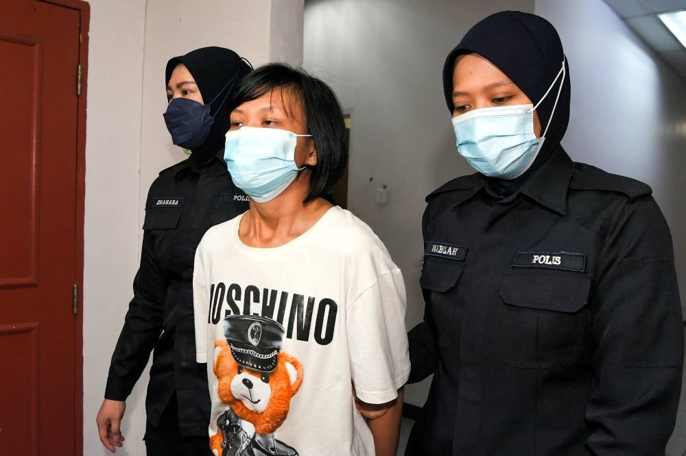 The charge, under Section 302 of the Penal Code and read together with Section 34 of the same Act, provides the death penalty upon conviction. - Bernama Photo