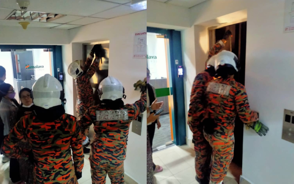 Firemen saved a woman who was trapped in an elevator at a shopping mall in Section 13, Petaling Jaya today.