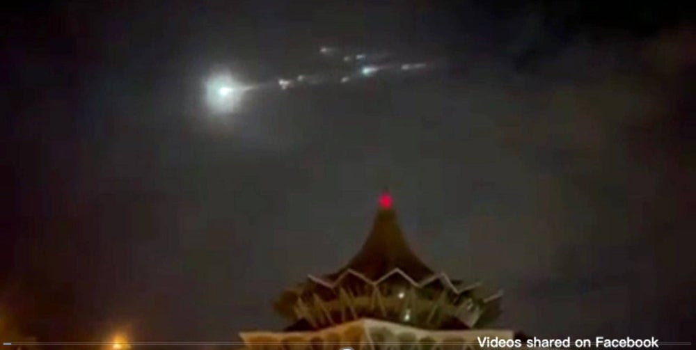 Bright objects suspected to be Chinese rocket debris that had fallen back to earth, were seen streaking across the night sky in Kuching last night. - Borneo Post Facebook pic 