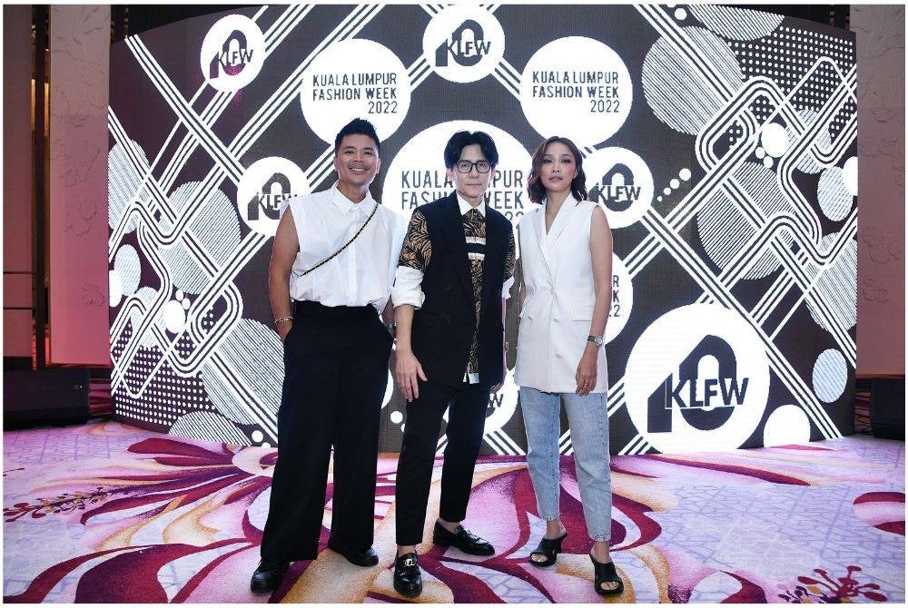 Founder of Kuala Lumpur Fashion Week, Andrew Tan (centre) with Scha Alyahya and Awal Ashaari.

