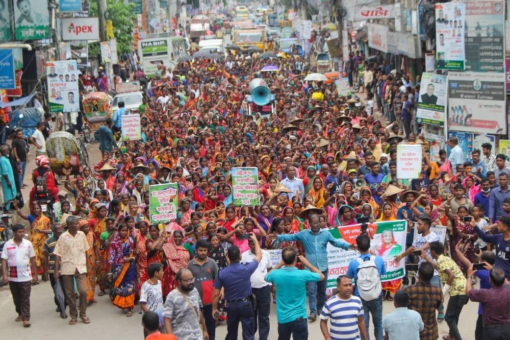 Bangladesh's tea garden workers protest in Srimangal on Aug 13, 2022. (Photo by AFP)