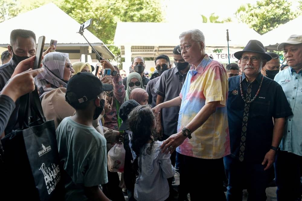 Ismail Sabri meeting visitors during MAHA at Maeps, Serday today. (Picture by BERNAMA)