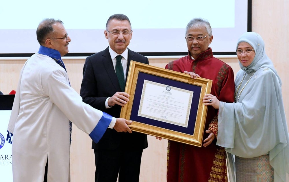 Yang di-Pertuan Agong Al-Sultan Abdullah Ri'ayatuddin Al-Mustafa Billah Shah recieved the Honorary Doctorate Degree in Political Science and International Relations from Marmara University presented by Marmara University Rector Prof Dr Mustafa Kurt (left) from Marmara University. - BERNAMA