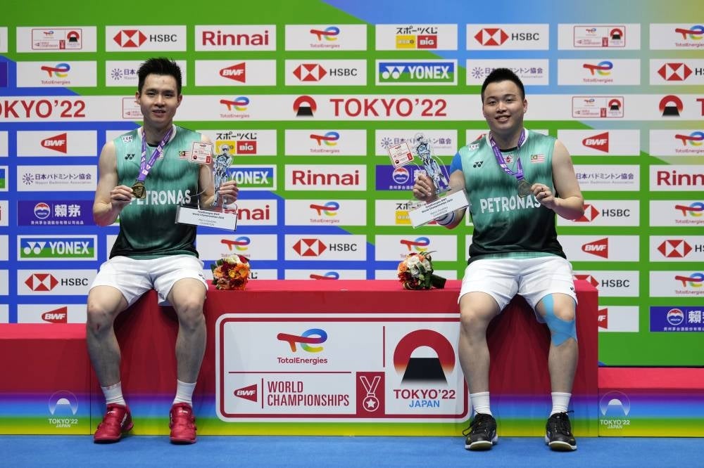 The win over the Indonesians, dubbed ‘The Daddies’, has made Aaron-Wooi Yik the first ever Malaysian shuttlers to be crowned world champions. - Photo: EPA/FRANCK ROBICHON