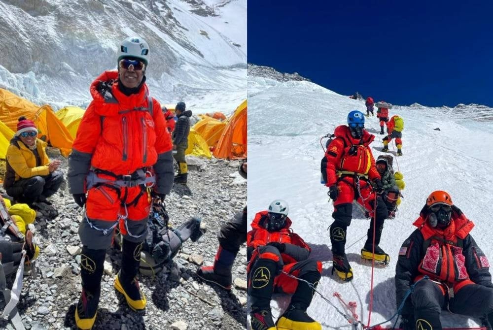 64-year old Elanghovan standing on the peak of Mount Everest - BERNAMA Photo