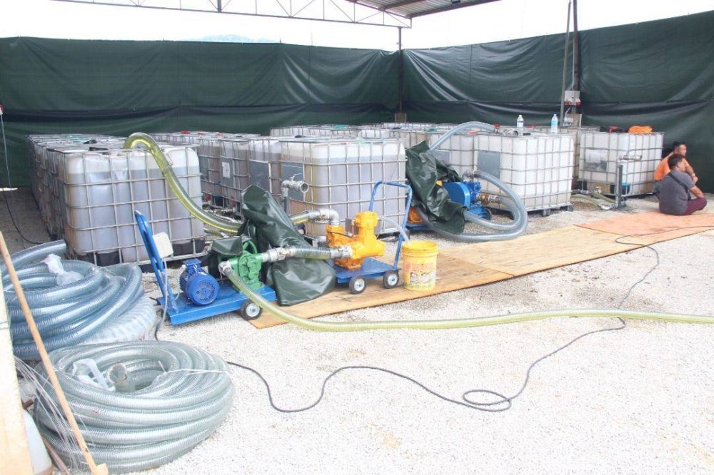 Some of the tank filled with diesel supplies were seized at the Semambu Industrial Estate here on Saturday. - Photo: Pahang Police
