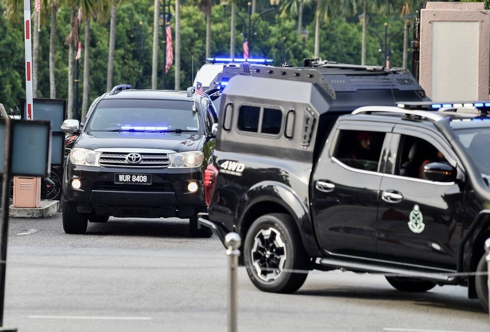 Datuk Seri Najib Razak arrived at the Kuala Lumpur Courts Complex for his 1MDB trial in a black SUV escorted by police and Prisons Department. - BERNAMA