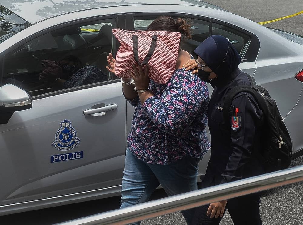 K Rineshini Naidu was alleged to have voluntarily caused grievous hurt to  Zailis with a wooden stick. - Bernama Photo