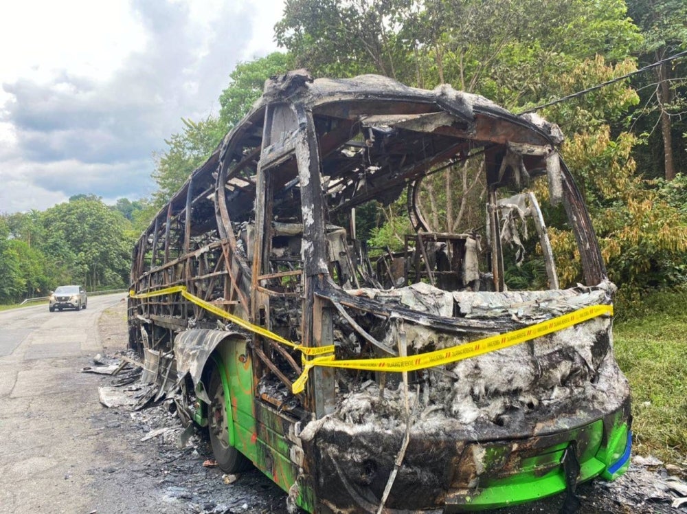 The condition of a tour bus caught fire on the JRTB route near Hentian Titiwangsa Gerik. - Photo courtesy of Perak Fire and Rescue