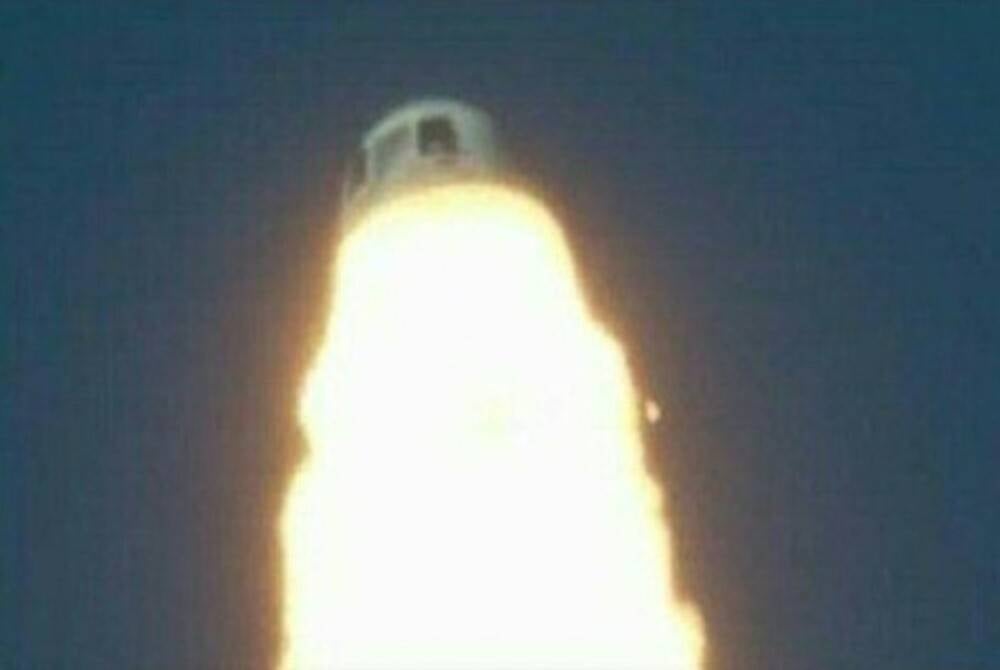 Photo from Blue Origin's video clip on Twitter showing the moment when the capsule fired emergency thrusters to separate from its booster
