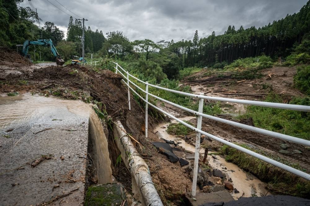A general view shows the site of a landslide caused by Typhoon Nanmadol in Mimata, Miyazaki prefecture on Sept 19, 2022. (Photo by YUICHI YAMAZAKI / AFP)