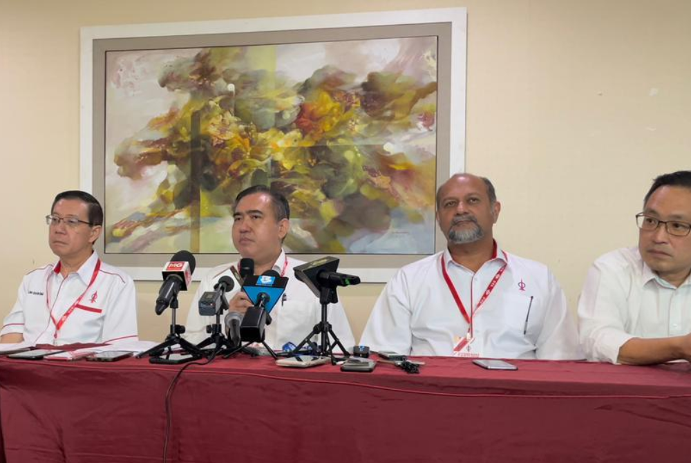 DAP secretary-general Anthony Loke (second from left) speaking during the press conference after the DAP Special Congress here, today.