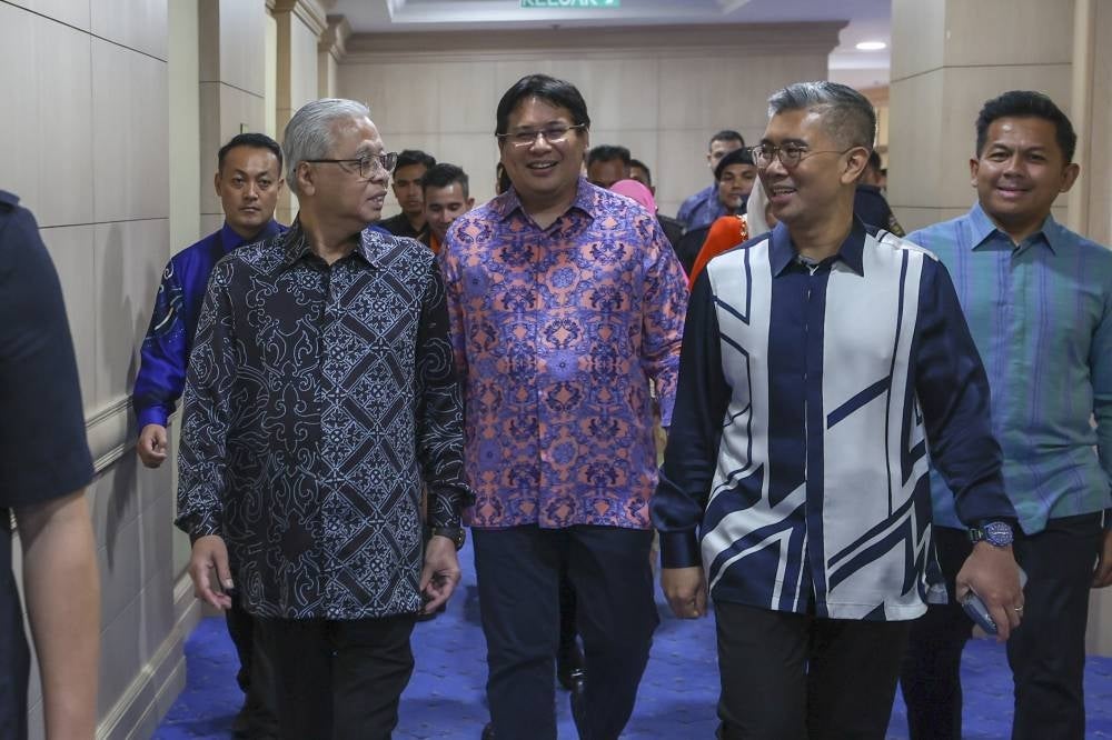 Ismail Sabri (second, left) accompanied by Tengku Zafrul today to check out the final preparations for the 2023 Budget at Finance Ministry, today. Photo: BERNAMA