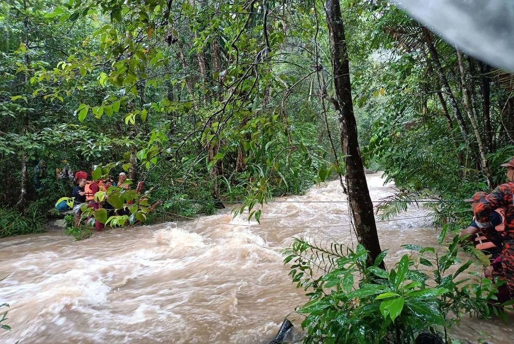 A total of 41 hikers were trapped by the Telaga Tujuh waterfall this morning. - Photo courtesy of JBPM Kedah
