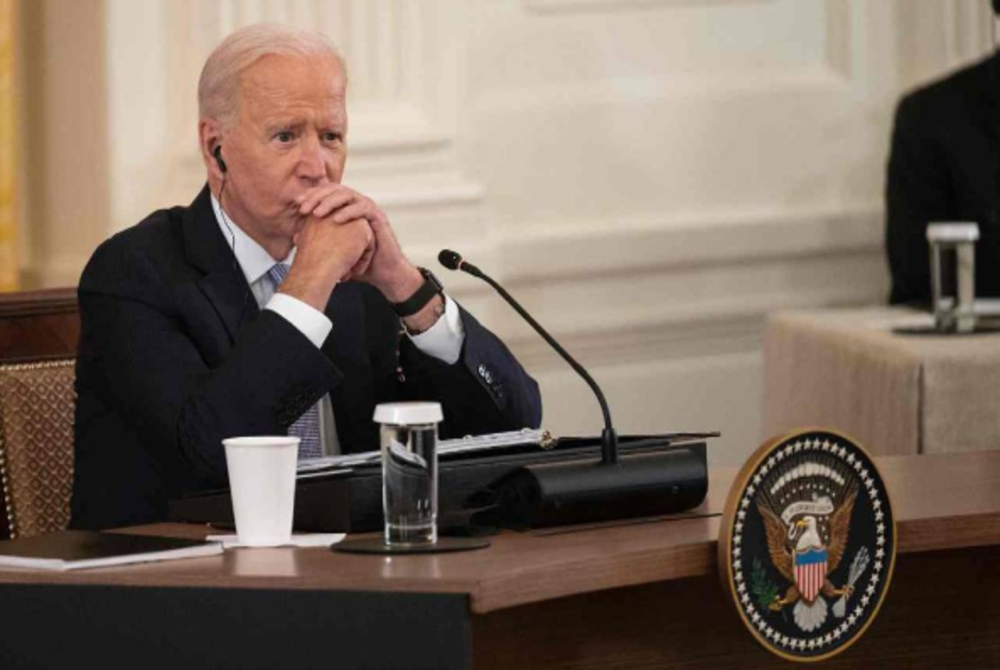 US President Joe Biden listening to India Prime Minister Narendra Modi spoke with Japan Prime Minister Suga Yoshihide and Australian Primer Minister Scott Morrison during the first-ever in-person Quad Leaders Summit in the East Room of the White House in Washington, DC on Friday - AFP-Yonhap