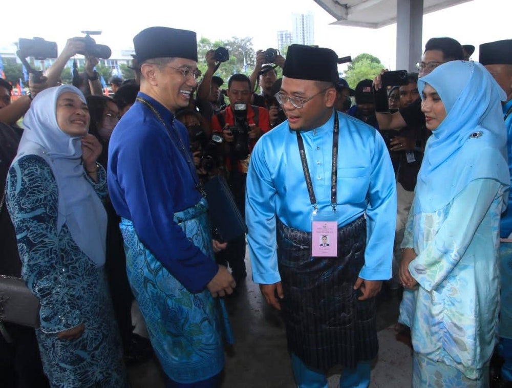 PN candidate and incumbent Gombak MP Datuk Seri Mohamed Azmin Ali with PH candidate Datuk Seri Amirudin Shari.