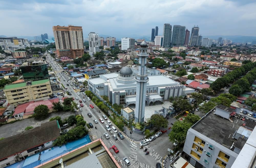 An aerial shot of the Kampung Baru mosque in Kuala Lumpur. Photo - 123RF