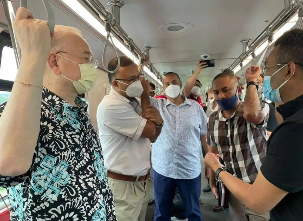 Wee Ka Siong boards LRT to review and test the effectiveness of its system and operational security.