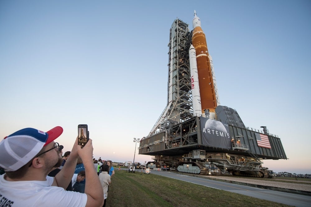 People watch the 2-story Artemis 1 rocket at the Kennedy Space Centre in Florida last March. - AFP Photo