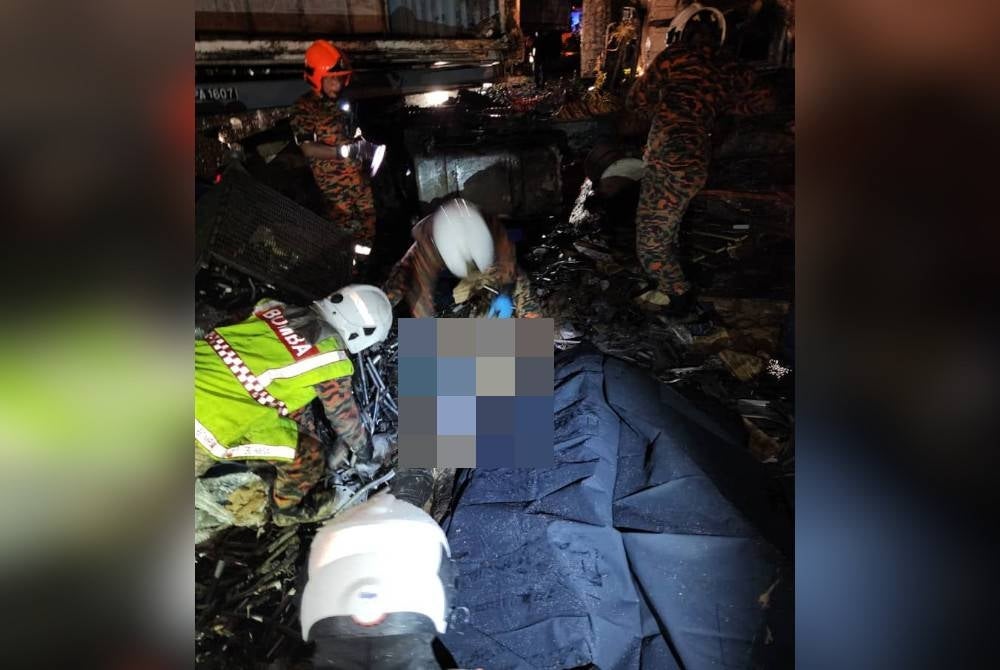 Firemen took over three hours to remove the victim. Photo by a reader.