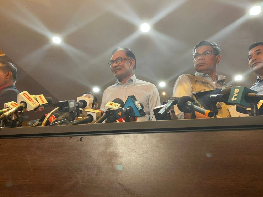 PH chairman Datuk Seri Anwar Ibrahim during a press conference at the Seri Pacific Hotel Kuala Lumpur after a meeting with BN leaders.