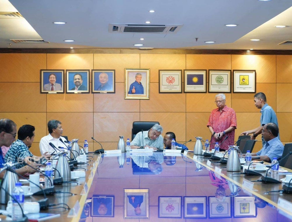 Datuk Seri Ahmad Zahid Hamidi and BN leaders during a Supreme Council meeting at Umno headquarters, today.