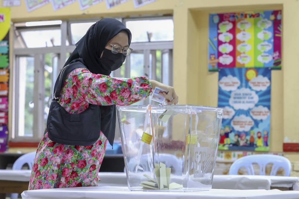 Youth voter Ainaa Humairah Azhan, 18, voted for the first time during GE15. Photo for illustrative purposes only - BERNAMA