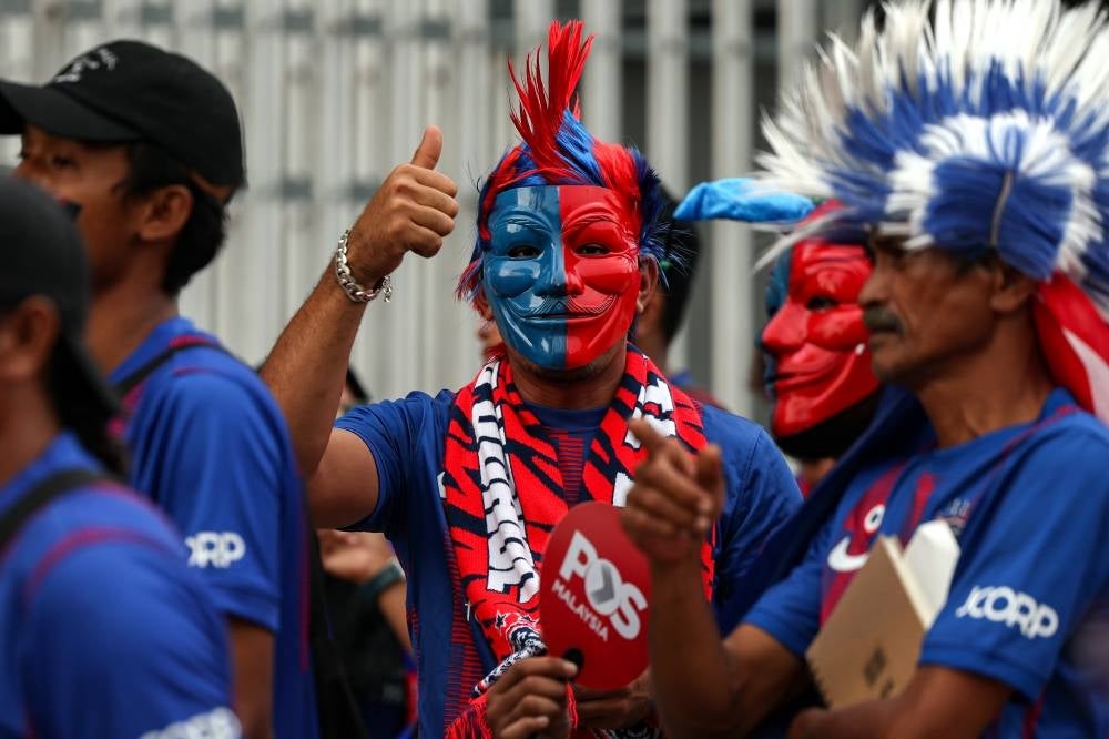 Among Johor Darul Ta’zim's (JDT) supporters at the National Stadium in Bukit Jalil for the 2022 Malaysia Cup final. - BERNAMA