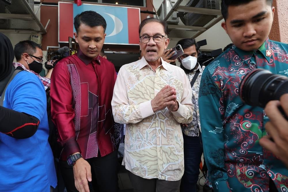 Anwar Ibrahim, who is PH chairman, after the Mesyuarat Majlis Presiden Pakatan Harapan at PKR HQ on Nov 28, 2022. 