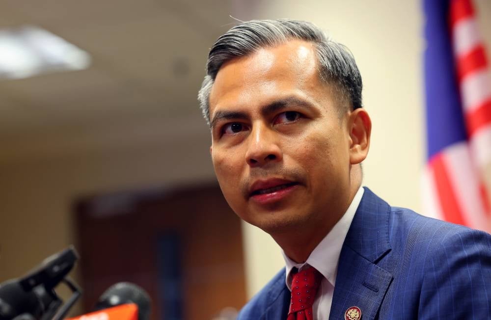 Fahmi beginning his first day officially at the Digital Communications Ministry here today. - BERNAMA