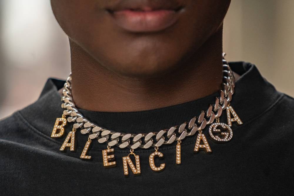Joseph Holland is seen wearing a necklace by Balenciaga x Gucci during New York Fashion Week at Spring Studios on Sept 11, 2022 in New York City. (Photo by David Dee Delgado / AFP)