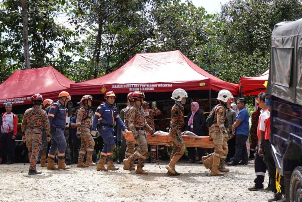 The rescue team focus on two of the three sectors of the campsite that was involved in the landslide at Batang Kali.