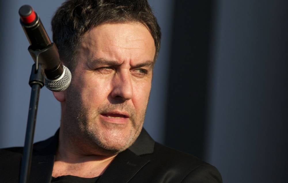 In this file photo taken on Aug 12, 2012 British lead vocal and member of The Specials, Terry Hall performs at the BT London Live. His bandmates announced Monday that Hall died after a brief illness. - (Photo by ANDREW COWIE / AFP)