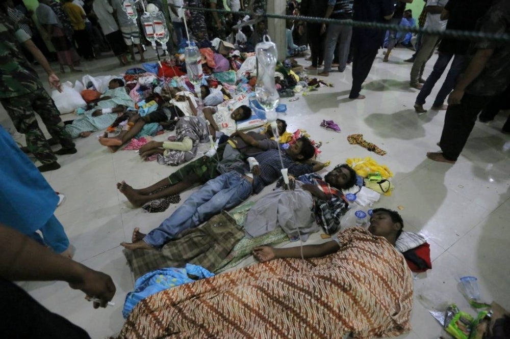 Rohingya refugees stranded in Ujong Pie village given immediate treatment. - AFP pic