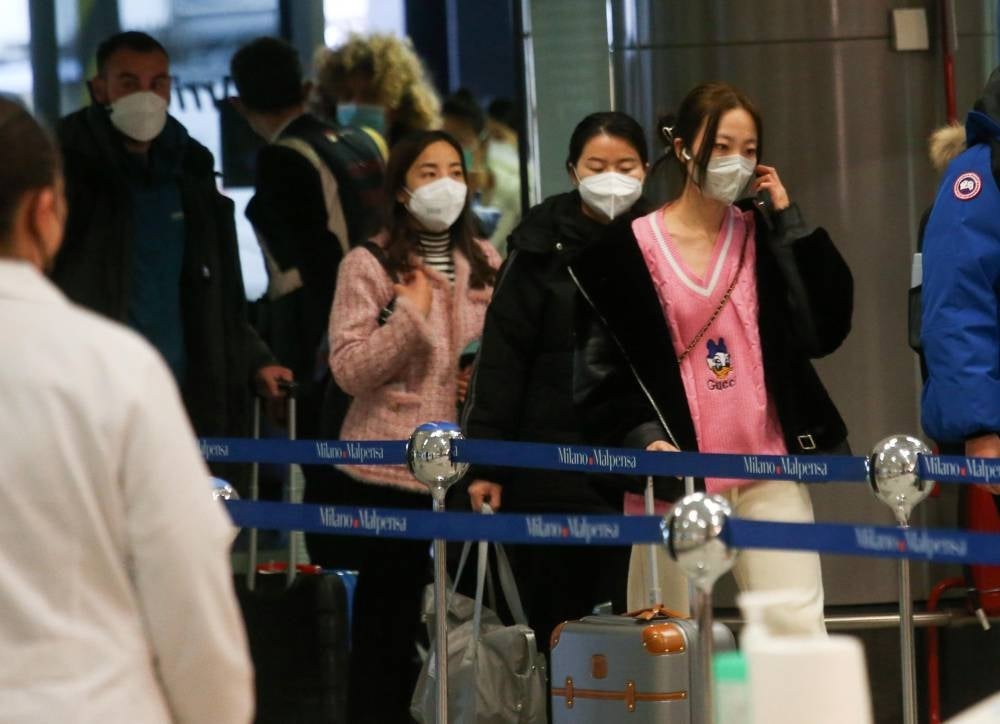 Under new restrictions announced only three days ago, all arrivals from China are obliged to undergo a PCR test within the first day of their entry - Pic by EPA/MATTEO BAZZI