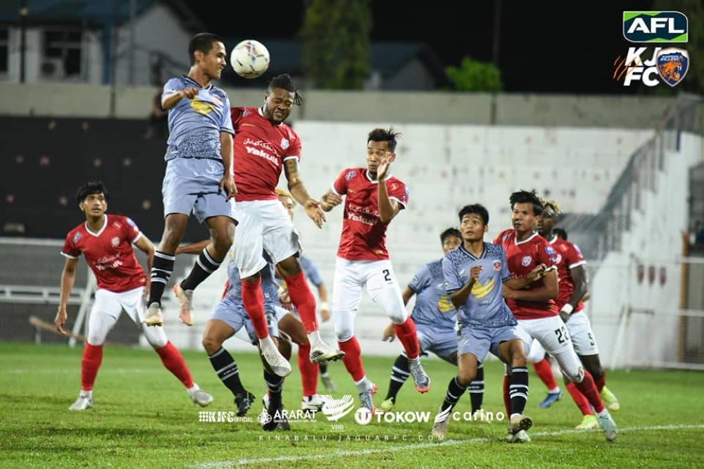 A recent game between KUFC (red jersey) and Kinabalu Jaguar FC on Friday. - Kinabalu Jaguar FC
FB photo