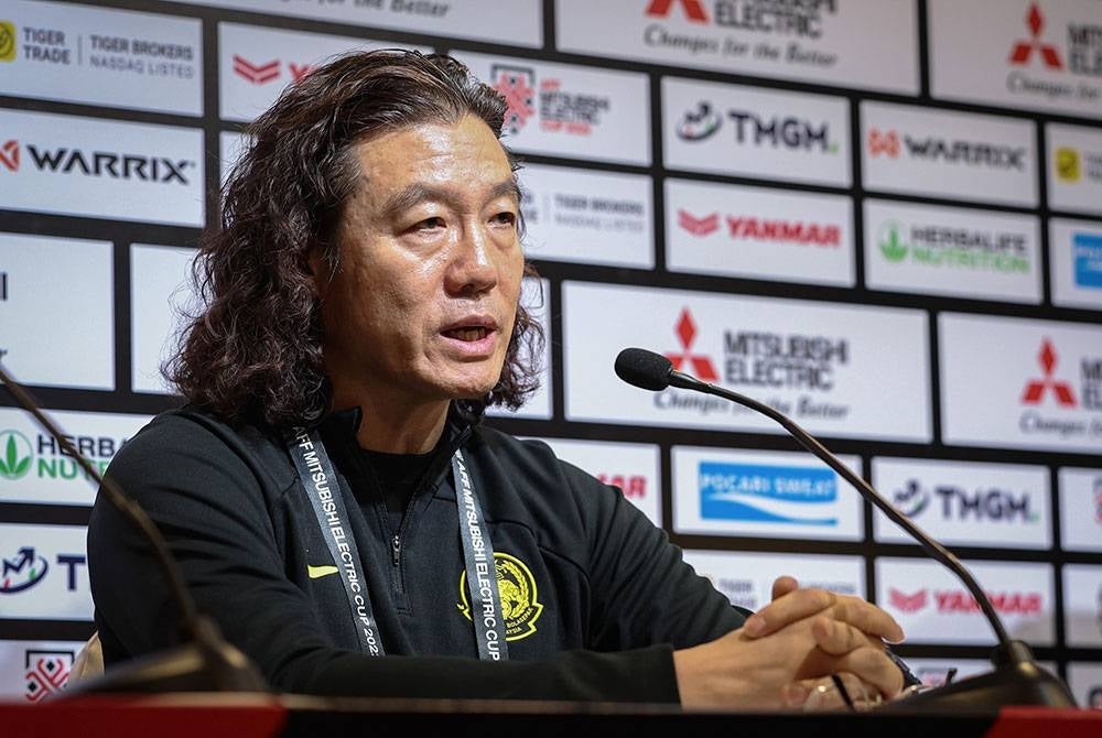 National football team head coach Kim Pan Gon addresses the media following Malaysia's exit from the AFF Mitsubishi Electric Cup last night.