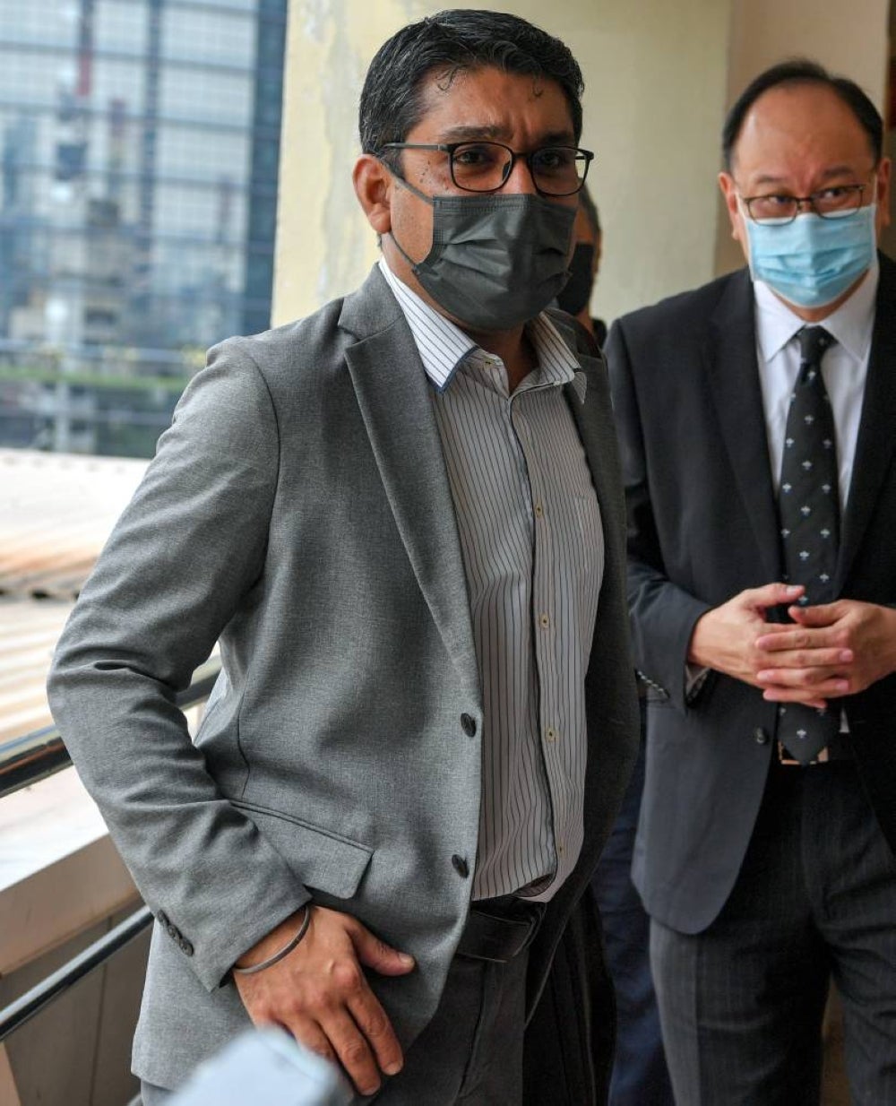 Magistrate Nurshahira Abdul Salim ordered Dr Gurdeep Singh, 45 (left) to be freed after finding that the prosecution had failed to prove a prima facie case against him.