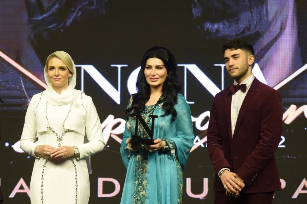 Toh Puan Ragad Kurdi Taib receiving the Nona VIP Award. - Photo by Rafeq Redzuan.