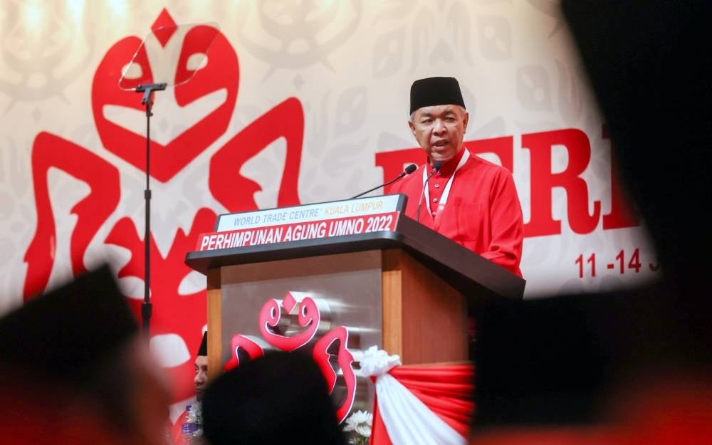 Deputy Prime Minister and Umno president Datuk Seri Ahmad Zahid Hamidi delivering his policy speech at the 2022 Umno General Assembly, at the Kuala Lumpur World Trade Centre. - BERNAMA