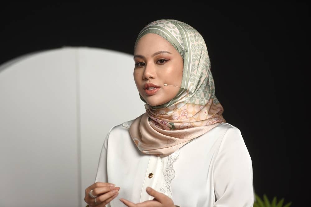 Associate financial planner, Erin Adlina Adnan - photo by Rafeq Redzuan