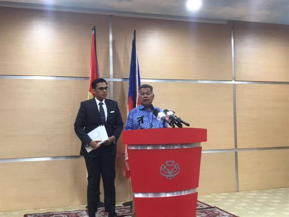Terengganu Umno chief Datuk Seri Ahmad Said with Umno lawyer Amin Othman (left)