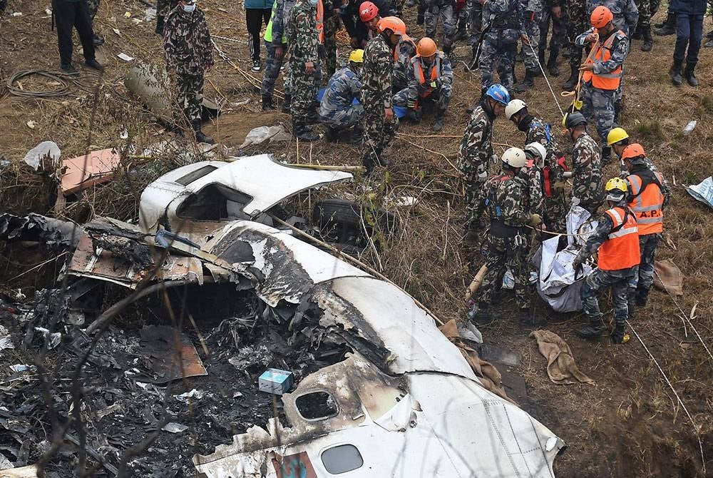 Nepali hospitals return bodies from air crash to grieving families - AFP Portal
