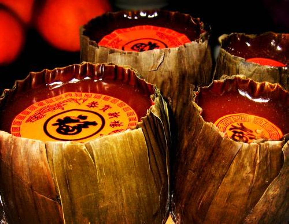 Making Kuih Bakul or Nian Gao requires patience as the lengthy process of steaming the cake takes about 10 to 12 hours.