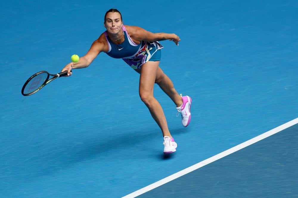Belarus' Aryna Sabalenka hits a return against Shelby Rogers of the US during their women's singles match on day four of the Australian Open tennis tournament in Melbourne. - AFP