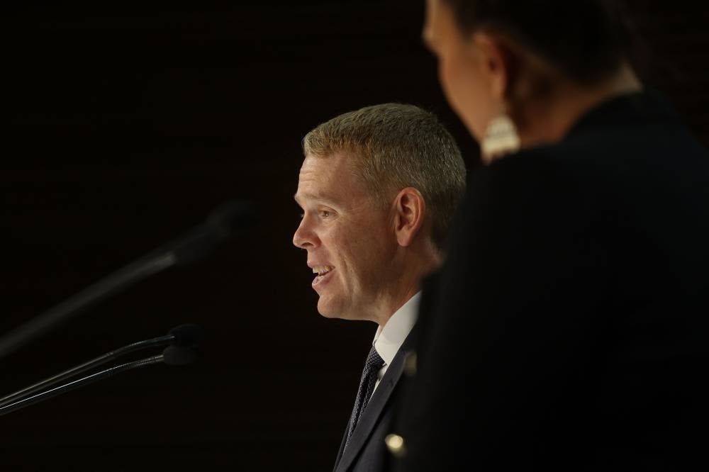 New Zealand's new Prime Minister Chris Hipkins (left) and his Deputy Prime Minister Carmel Sepuloni attend their first press conference at Parliament in Wellington on Jan 22, 2023. (Photo by MARTY MELVILLE / AFP)