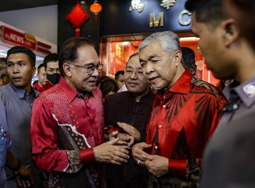 Deputy Prime Minister Datuk Seri Dr Ahmad Zahid Hamidi accompanied Prime Minister Datuk Seri Anwar Ibrahim to the MCA Chinese New Year Open House at Wisma MCA in Kuala Lumpur today. - Photo: Bernama