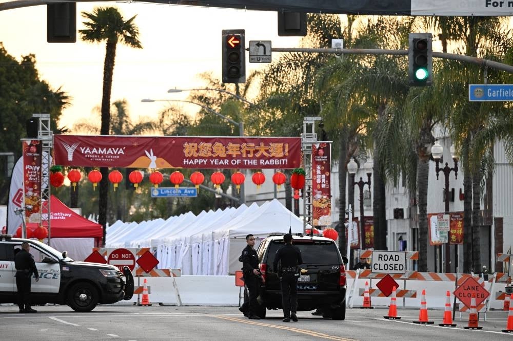 Police work near the scene of a mass shooting in Monterey Park, California, on Jan 22, 2023. - (Photo by ROBYN BECK / AFP)